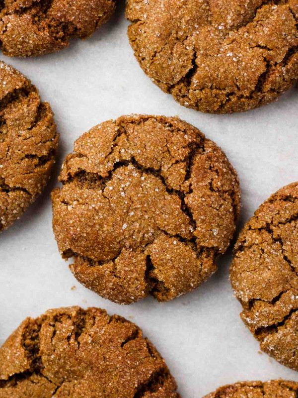 vegan ginger molasses cookies on a baking tray close up