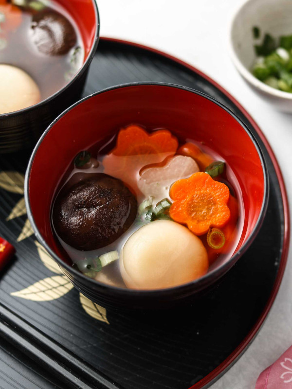 ozoni japanese new years mochi soup in a bowl with carrots and daikon kansai style