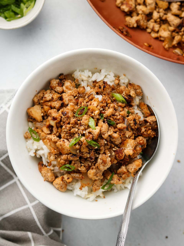 asian ground tofu crumbles over rice