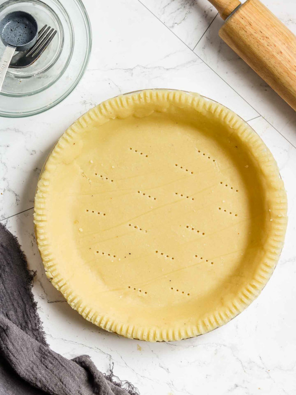 vegan gluten free almond flour pie crust finished in a glass dish