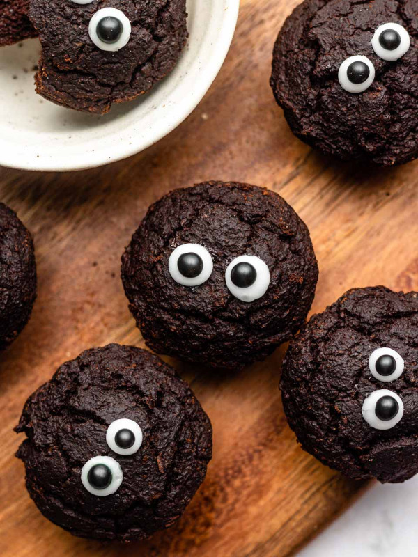 mini brownie bites with eyes on a cutting board