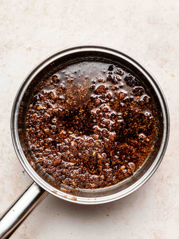 black garlic oil in a sauce pan