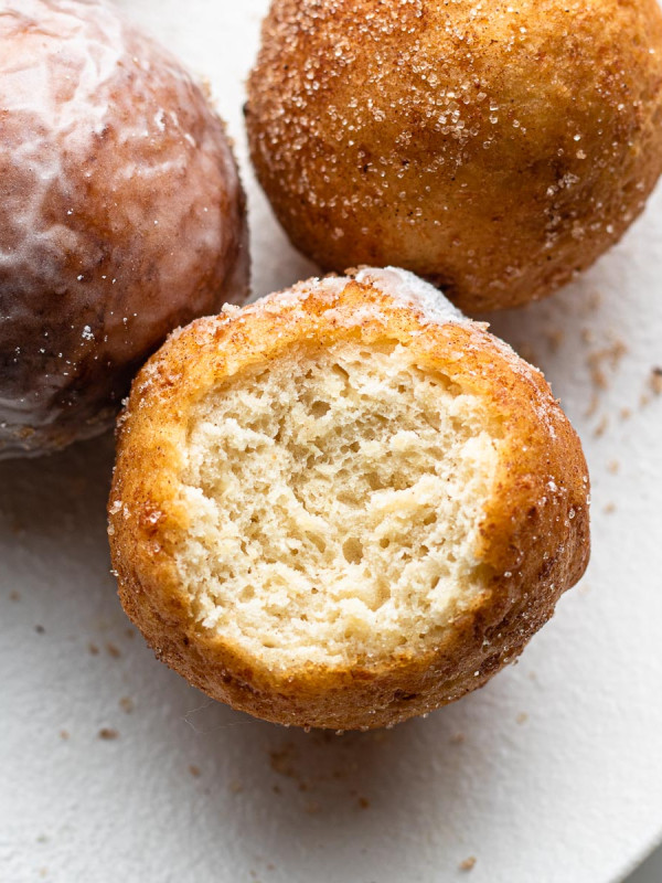 tofu donut hole bitten on a white plate
