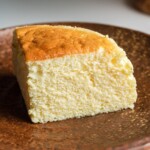 yogurt souffle cake on a brown plate