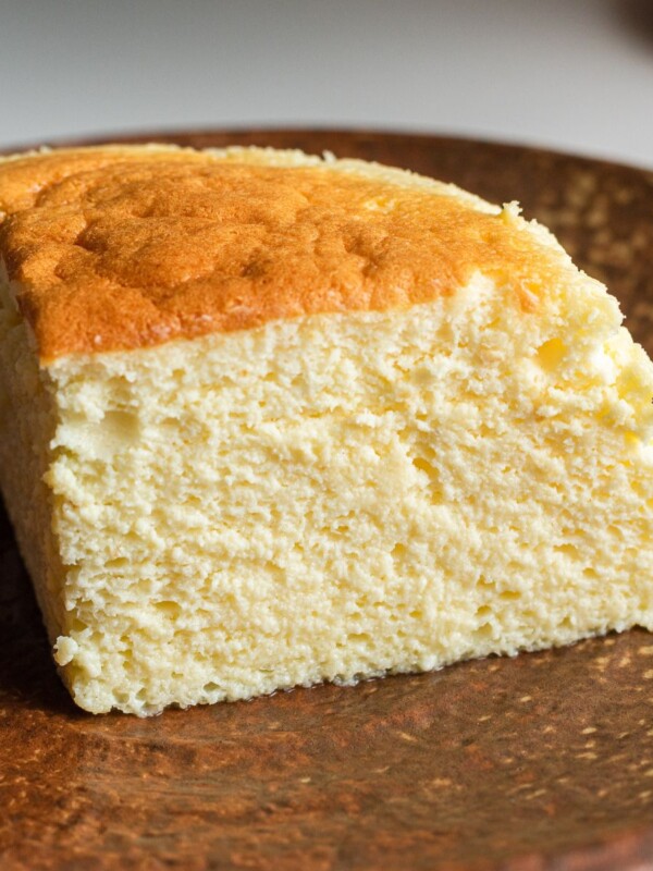 yogurt souffle cake on a brown plate