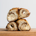 stuffed french toast bagels sliced in half with cream cheese inside