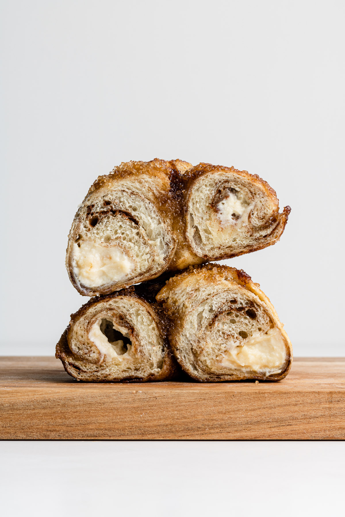 stuffed french toast bagels sliced in half with cream cheese inside