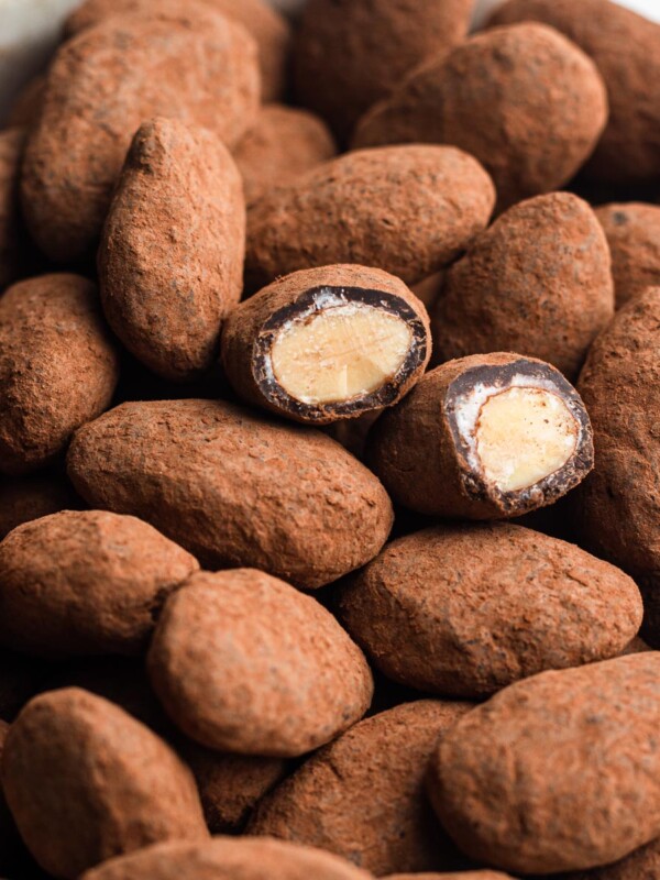 cocoa dusted candied chocolate covered almonds in a bowl