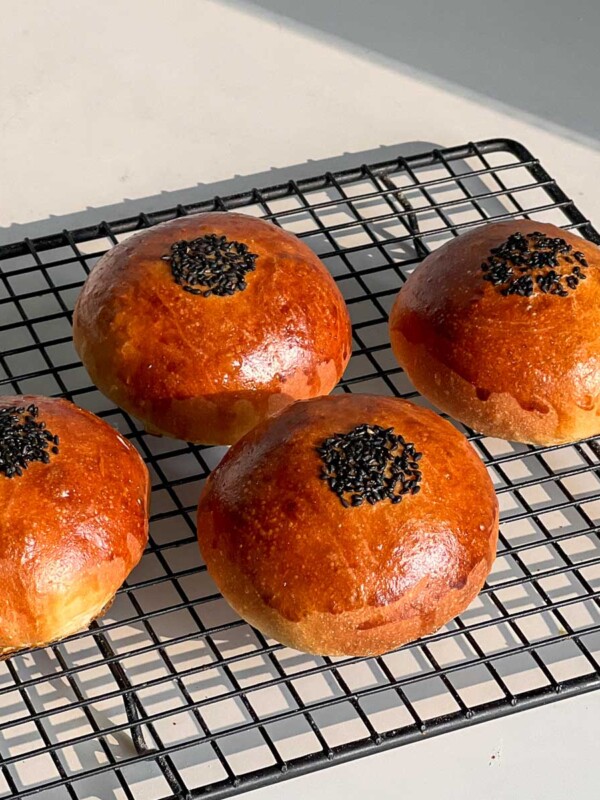 anpan (japanese sweet red bean buns) on a wire rack