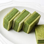 matcha nama chocolate sandwich cookies on a plate