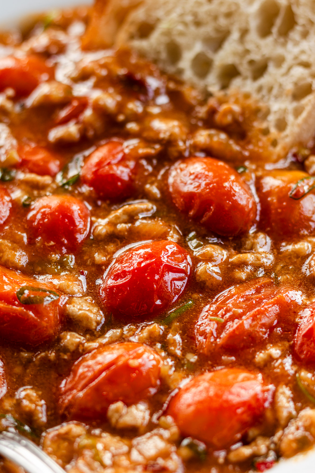 mapo tomato in a bowl with bread