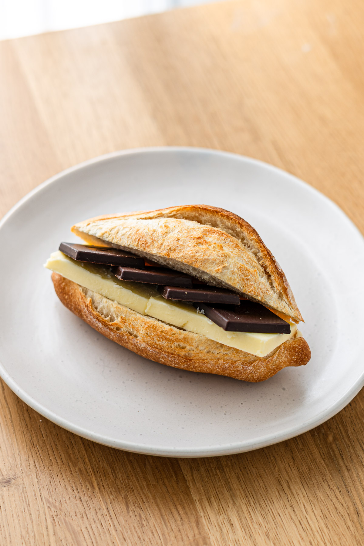 french chocolate butter baguette on a white plate
