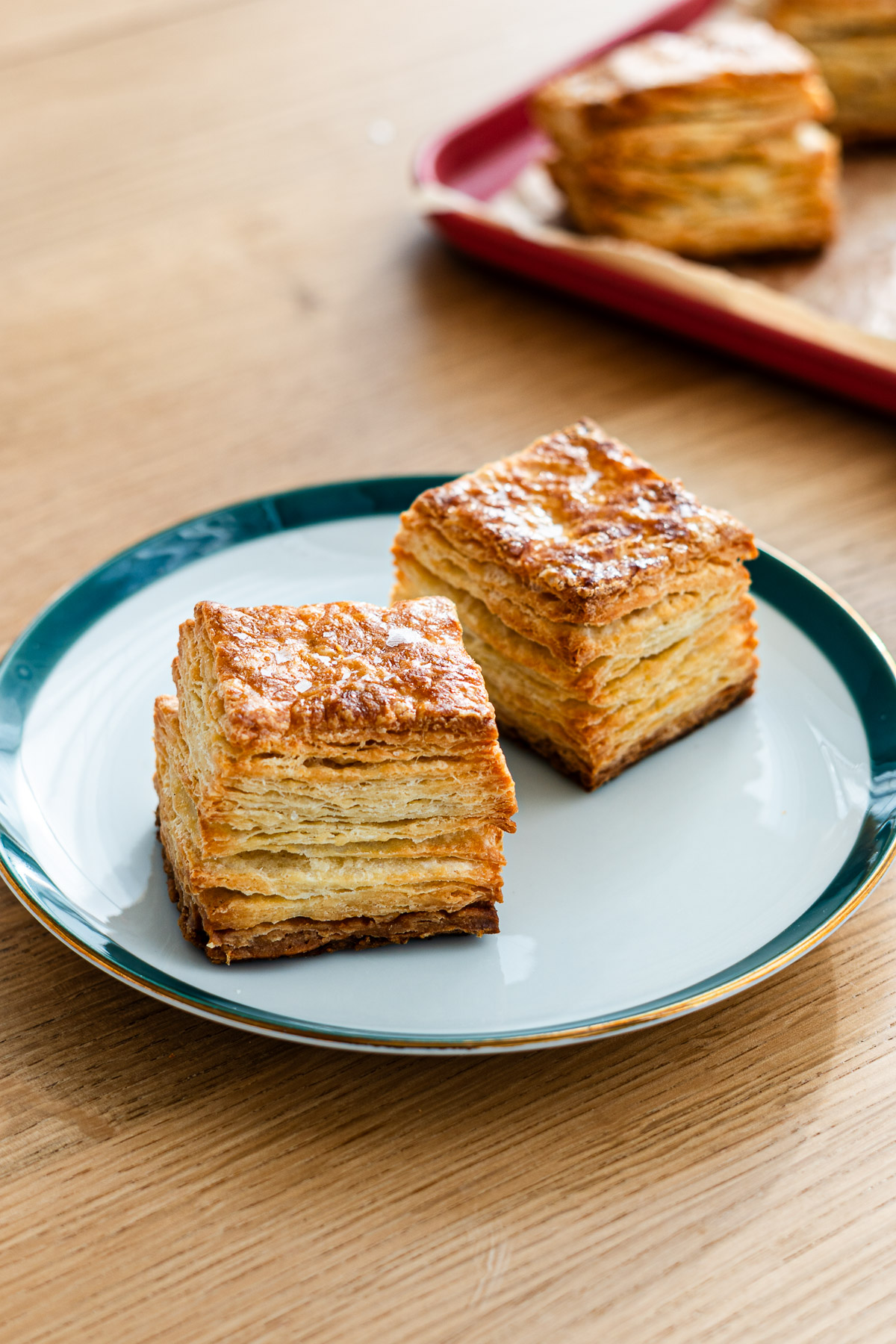 croissant scones on a small green rimmed plate