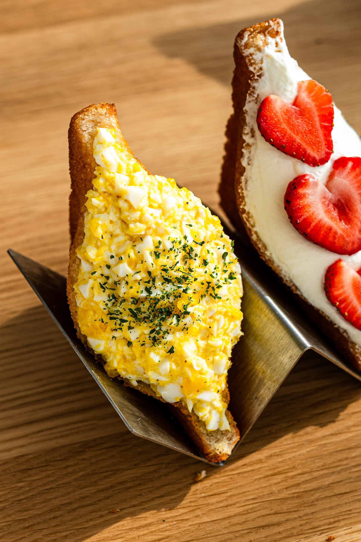 japanese fried egg salad sandwich on a taco holder